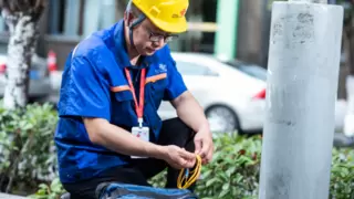 小区里的“网速医生”：恩施联通免费测速暖了邻里心