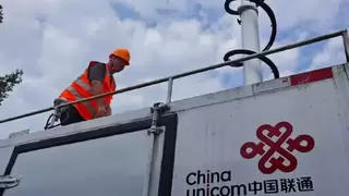 荆门联通：入户服务多一份考量 暖心关照宠物家庭