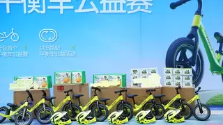 酷骑杯公益赛走进河源：一辆童车连接两段童年